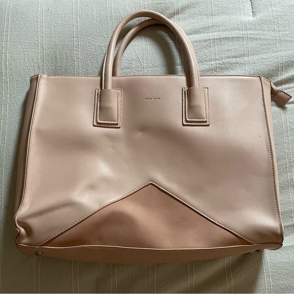 Blush pink briefcase bag.  Barely used and could use a tiny bit of reshaping